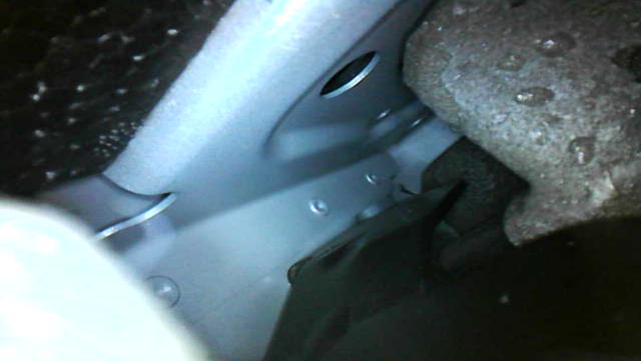 Behind the boot liner at the bottom corner.jpg
